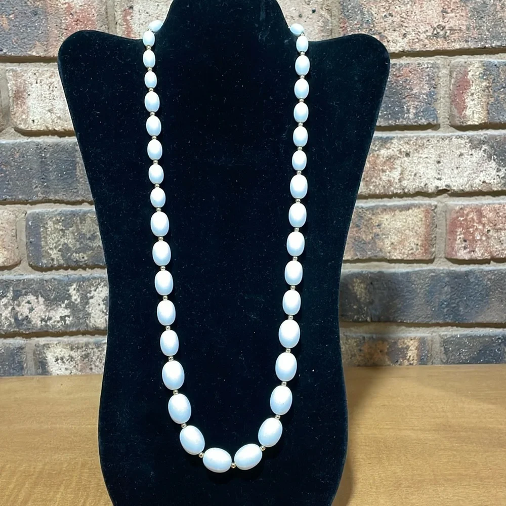 Monet White Graduated Oval beads with gold tone beaded separators